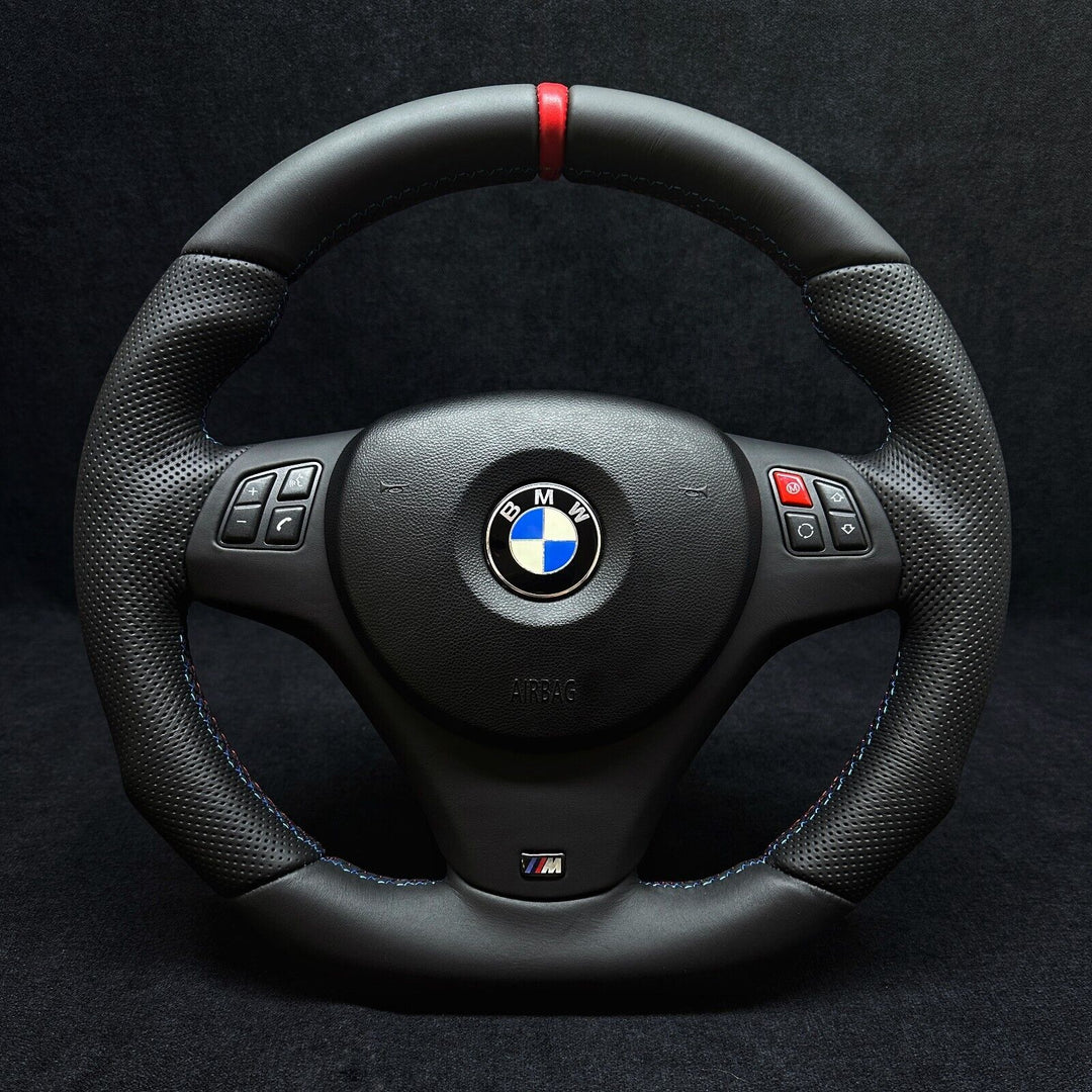 M RED BUTTON STEERING WHEEL