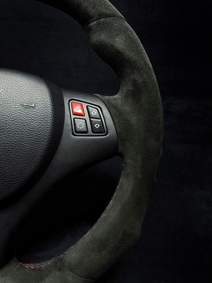 BMW LEATHER AND RED BUTTON PHOTO