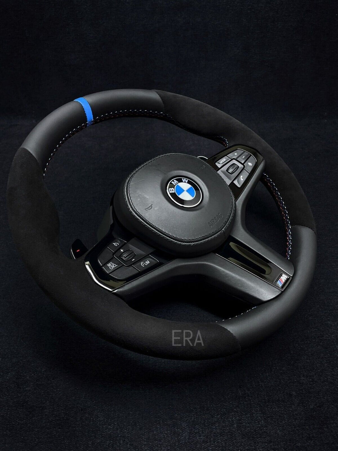 M STITCHING / PIANO BLACK TRIM AND SHIFT PADDLES