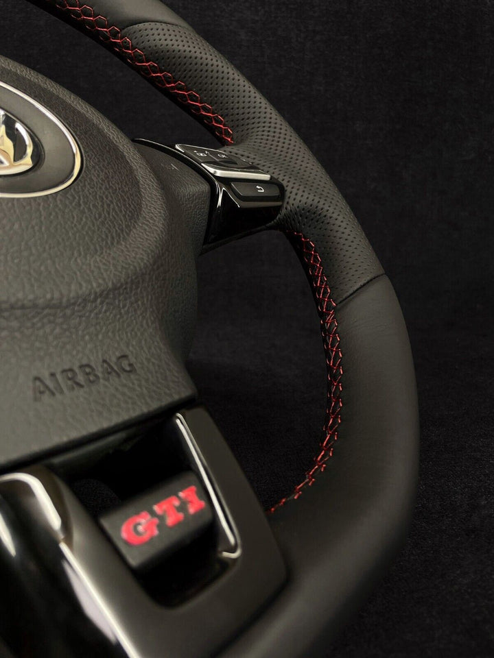VW PERFORATED STEERING WHEEL RED STITICHING 