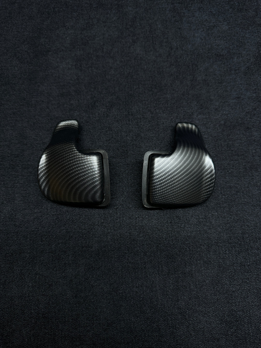 matte carbon style shift paddles for a BMW vehicle